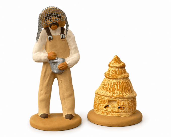 Apiculteur et ruches